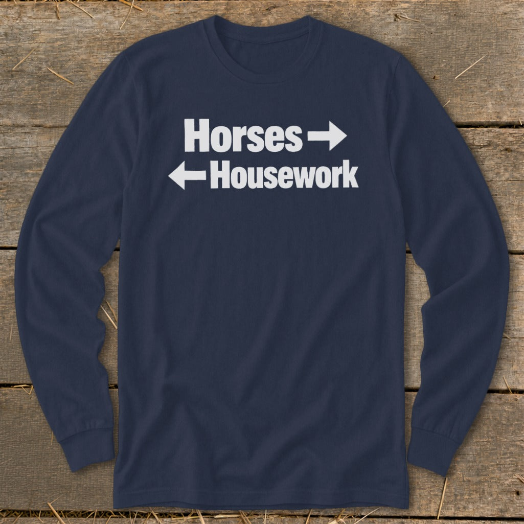 Navy blue long-sleeve t-shirt with white text reading "Horses" and "Housework" with directional arrows.