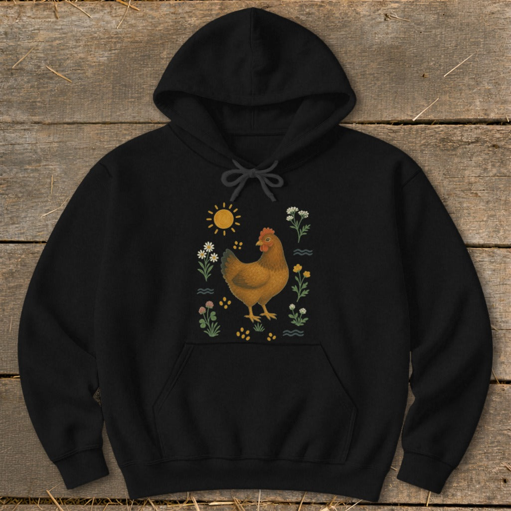 Black hoodie with illustration of a brown chicken among flowers and sun.