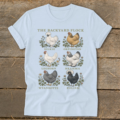 Light blue t-shirt with "The Backyard Flock" title and illustrations of six chicken breeds.