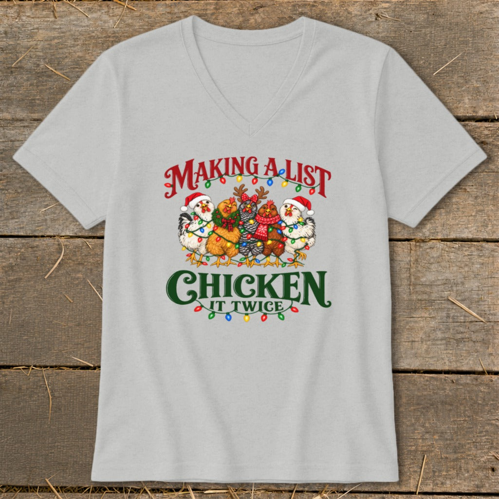 Christmas chickens in Santa hats and scarves with lights and the words "Making a List, Chicken It Twice".