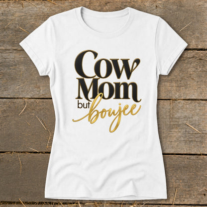 White t-shirt with black and gold text that says "Cow Mom but boujee".