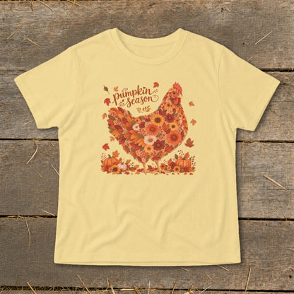 Yellow t-shirt with a floral chicken and "pumpkin season" text.