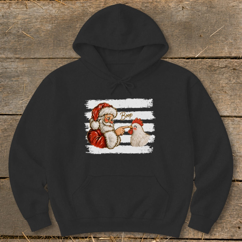 Santa Claus Boops a chicken with the word "Boop" above them.
