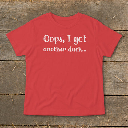 Red t-shirt with white text that reads "Oops, I got another duck..."