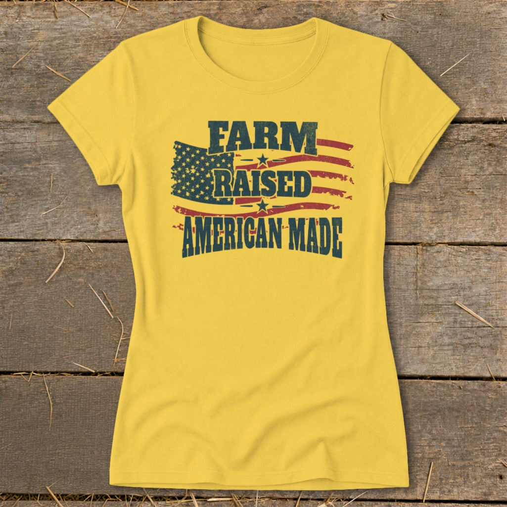 Yellow t-shirt with distressed American flag graphic and text: FARM RAISED AMERICAN MADE