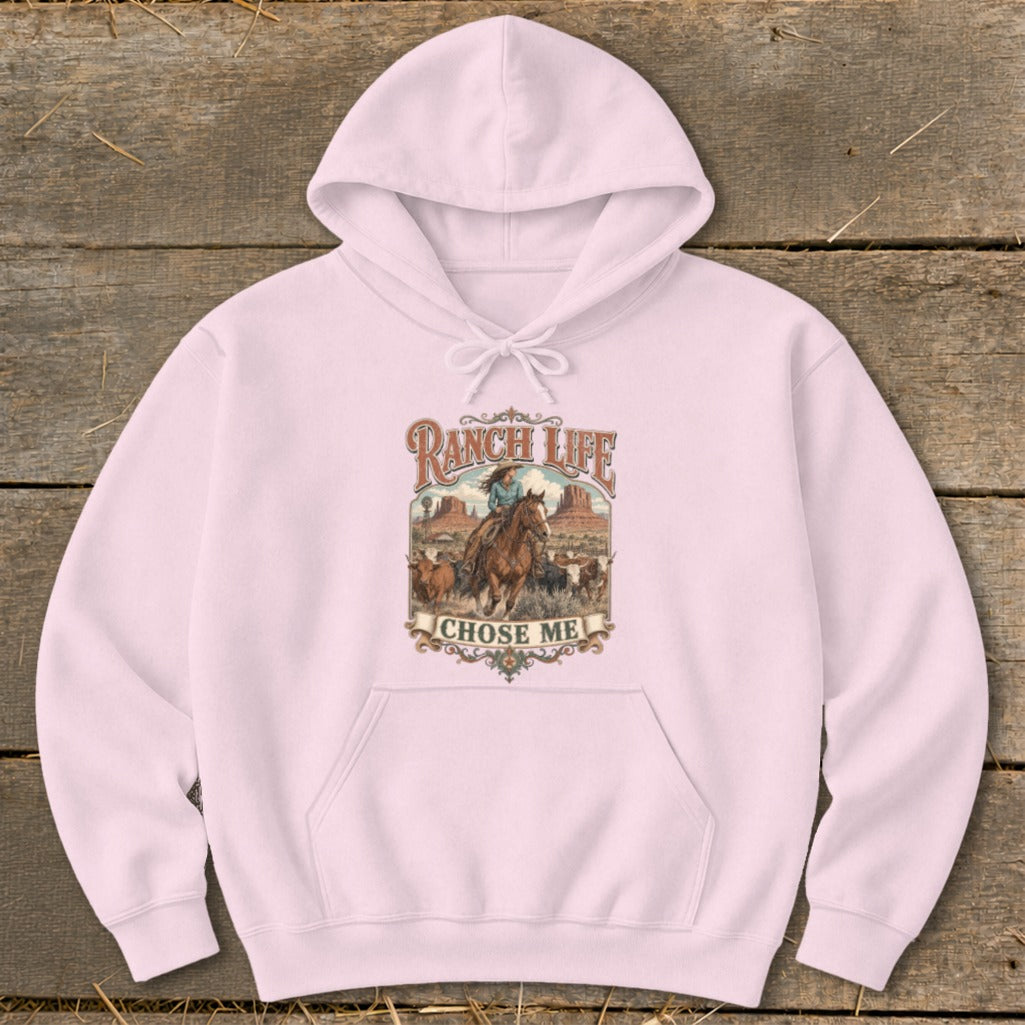 Pink hoodie with "Ranch Life Chose Me" graphic featuring a cowboy on horseback and cattle.