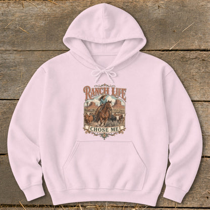 Pink hoodie with "Ranch Life Chose Me" graphic featuring a cowboy on horseback and cattle.