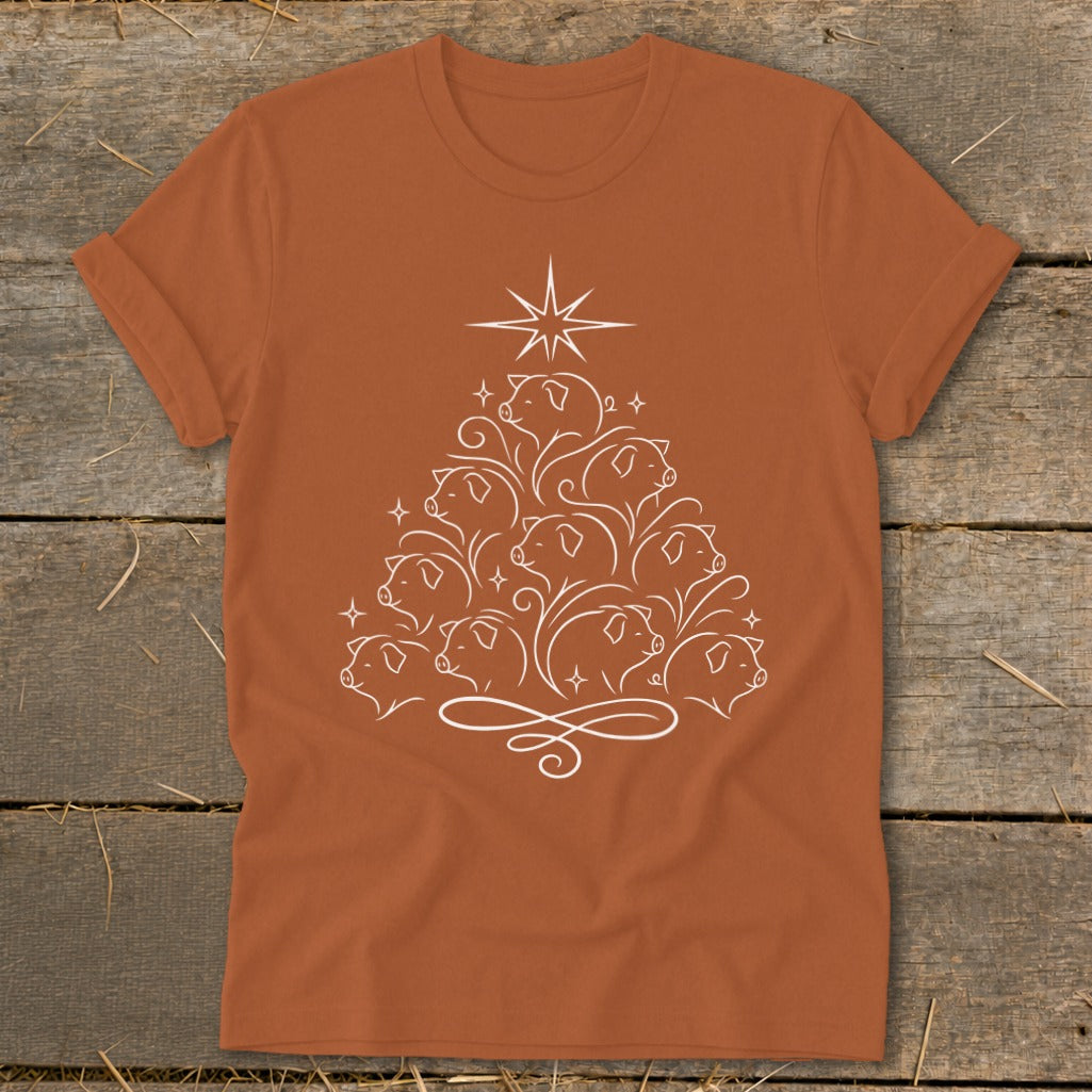 Orange t-shirt with white outline of a Christmas tree made of pigs and a star.