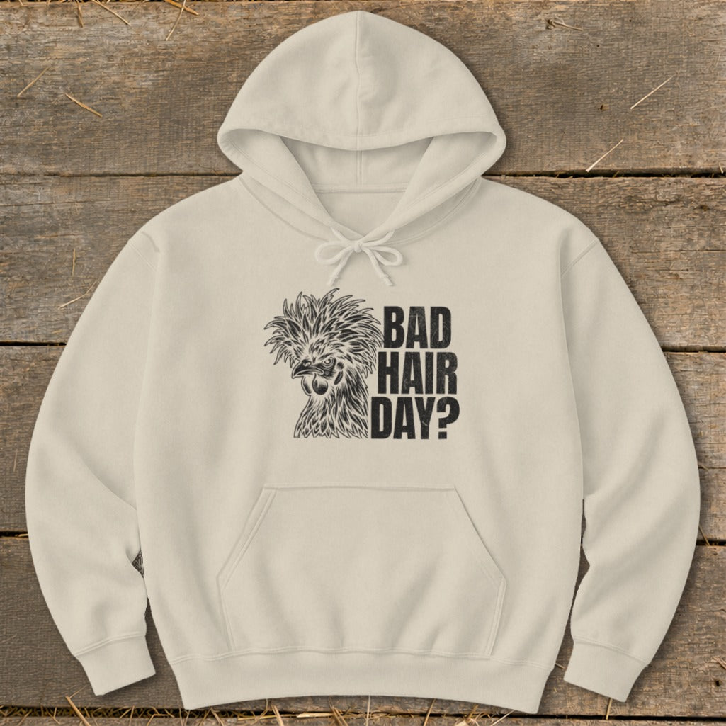 Cream hoodie with a drawing of a chicken and text that reads "BAD HAIR DAY?".
