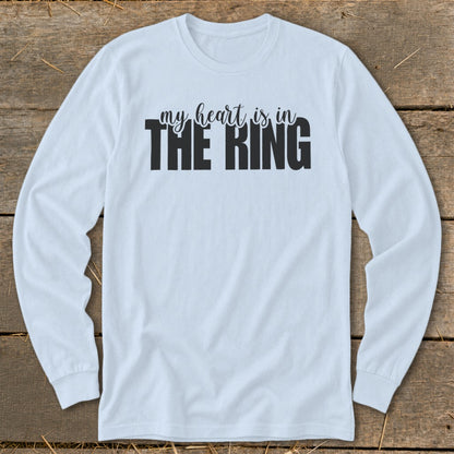 Light blue long-sleeve shirt with black text "my heart is in THE RING".