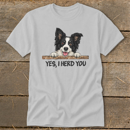Light gray t-shirt with a smiling border collie illustration saying "YES, I HERD YOU."