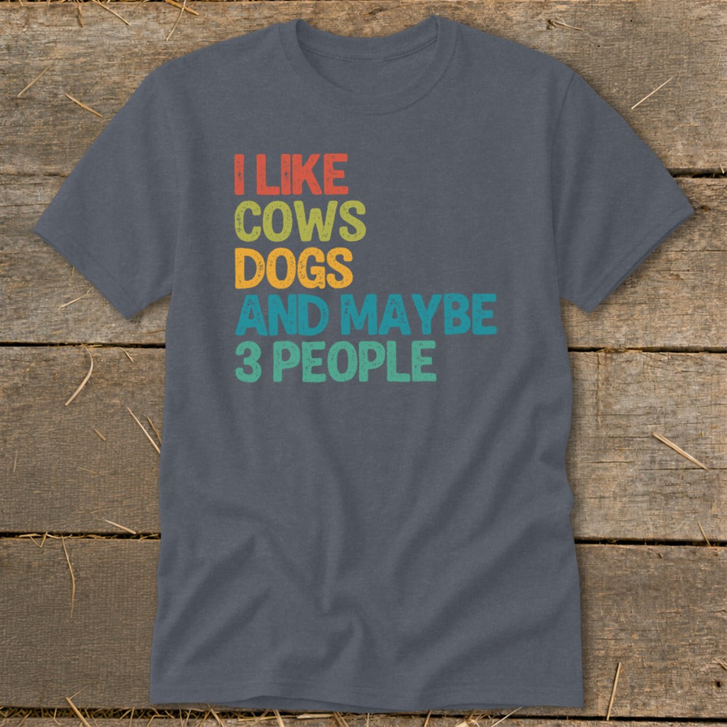 Dark gray t-shirt with text: I LIKE COWS DOGS AND MAYBE 3 PEOPLE.