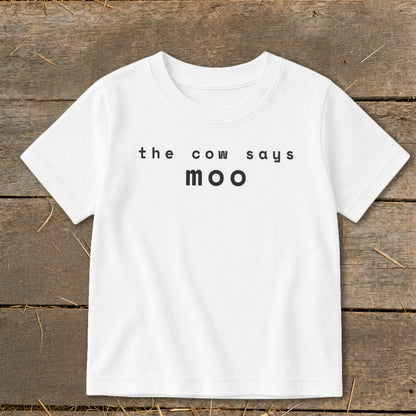 White t-shirt with black text that reads "the cow says moo".