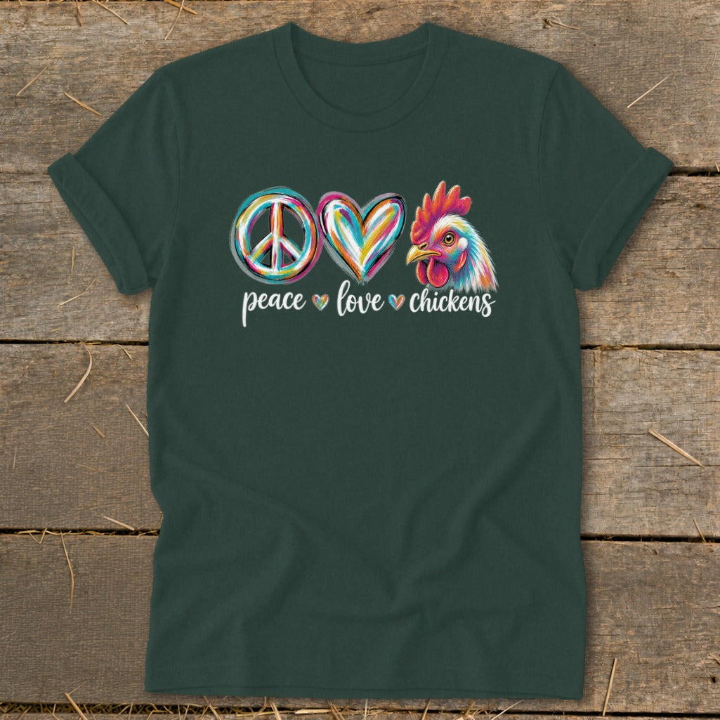 Dark green t-shirt with "peace love chickens" text and colorful graphics.