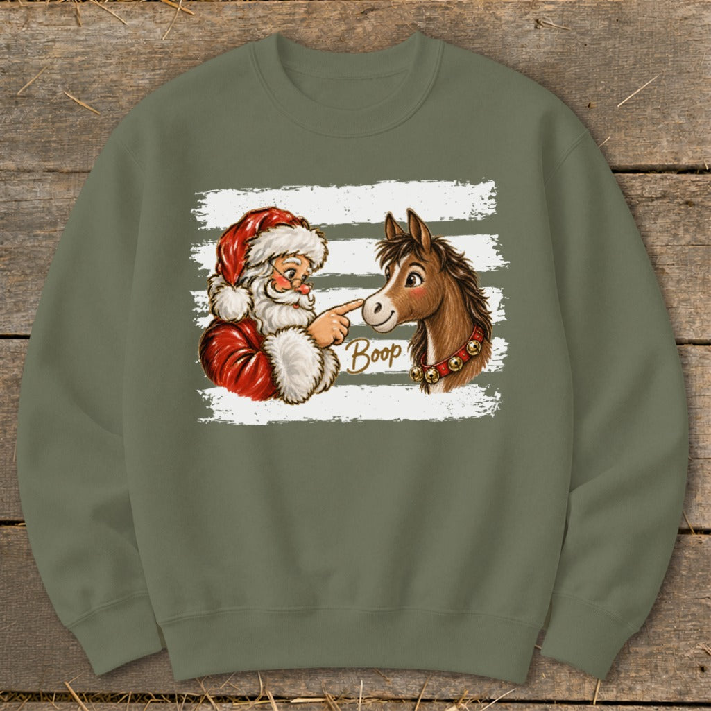 Santa booping a horse with the word "Boop" printed next to it.