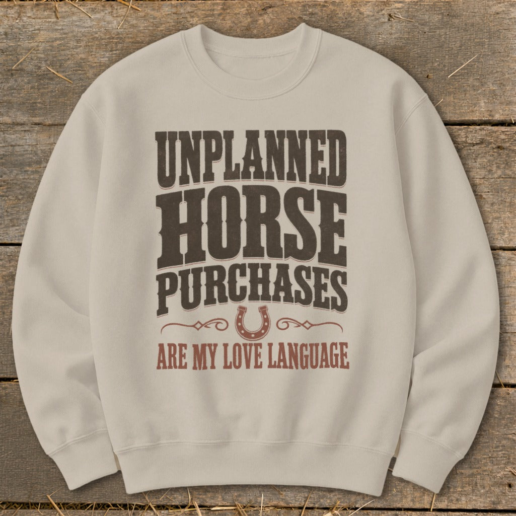 Light beige sweatshirt with "Unplanned Horse Purchases Are My Love Language" text.