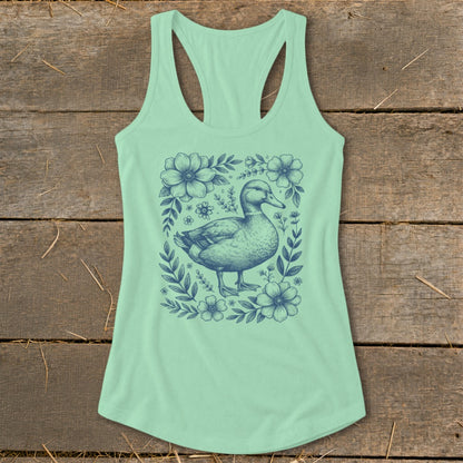 Mint green tank top with a navy blue duck and floral illustration.