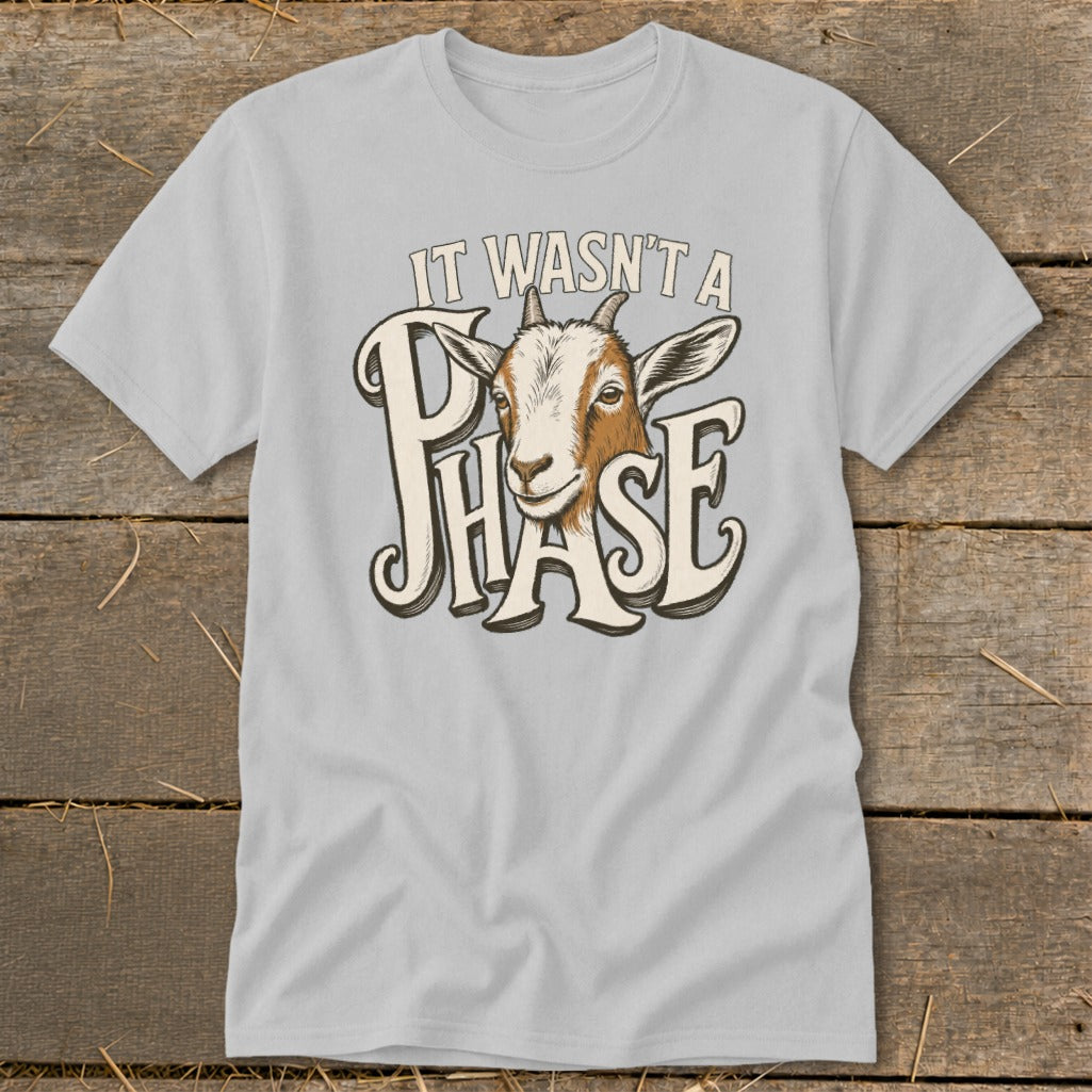 Grey t-shirt with a goat's head and the text "IT WASN'T A PHASE."
