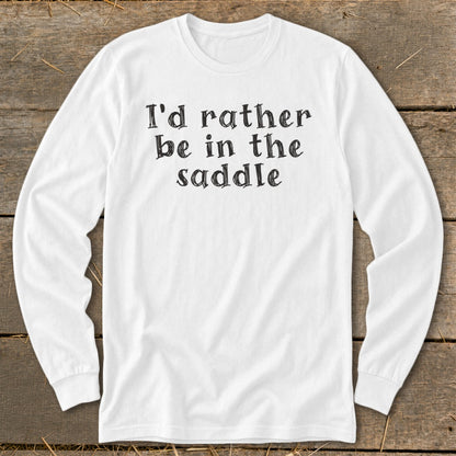 White long-sleeve shirt with black text that reads "I'd rather be in the saddle."