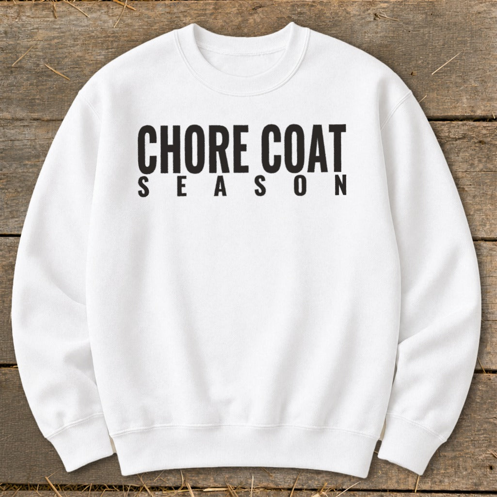 White sweatshirt with black text that reads "CHORE COAT SEASON"