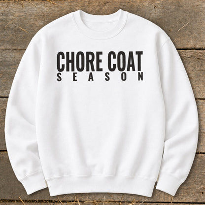 White sweatshirt with black text that reads "CHORE COAT SEASON"