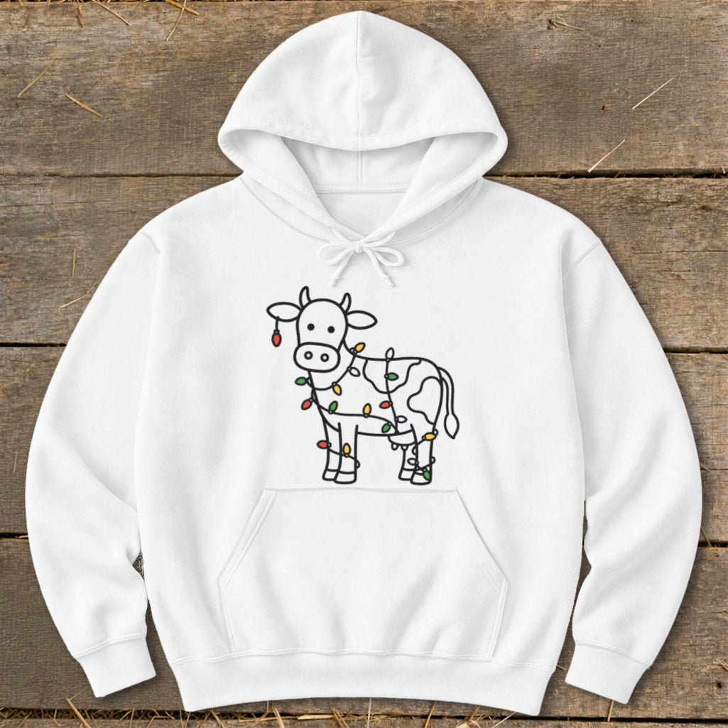 White hoodie with a black line art cow wrapped in colorful Christmas lights.