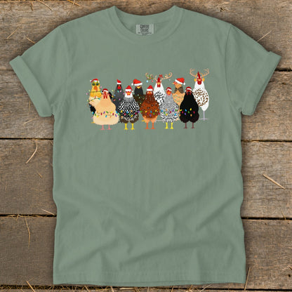 T-shirt with a graphic of chickens wearing Santa hats and Christmas lights.
