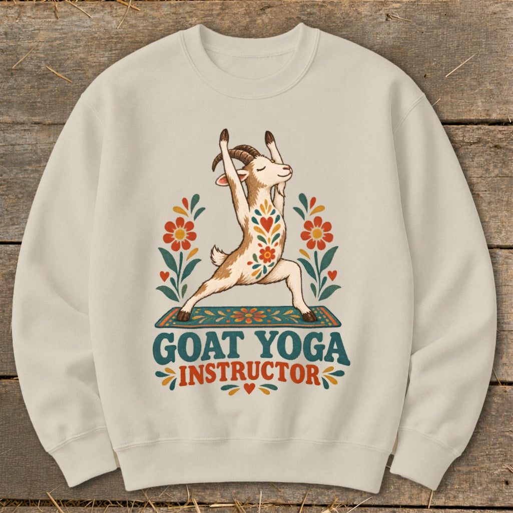 Cream sweatshirt with a goat in yoga pose and text "Goat Yoga Instructor."