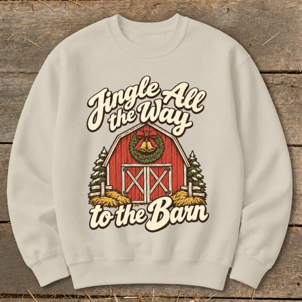 Cream sweatshirt with Christmas barn graphic and text "Jingle All the Way to the Barn".