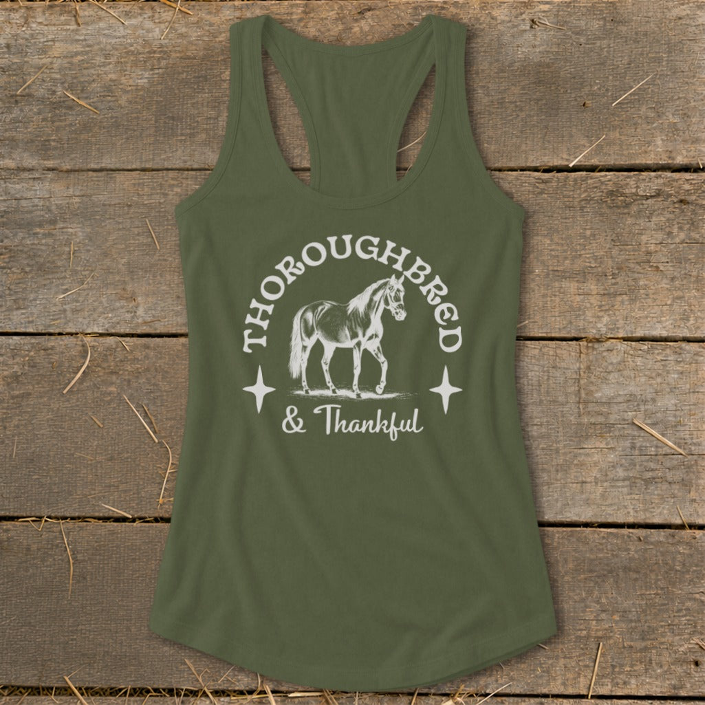 Green tank top with a circle design featuring a horse, "Thoroughbred", and "& Thankful".