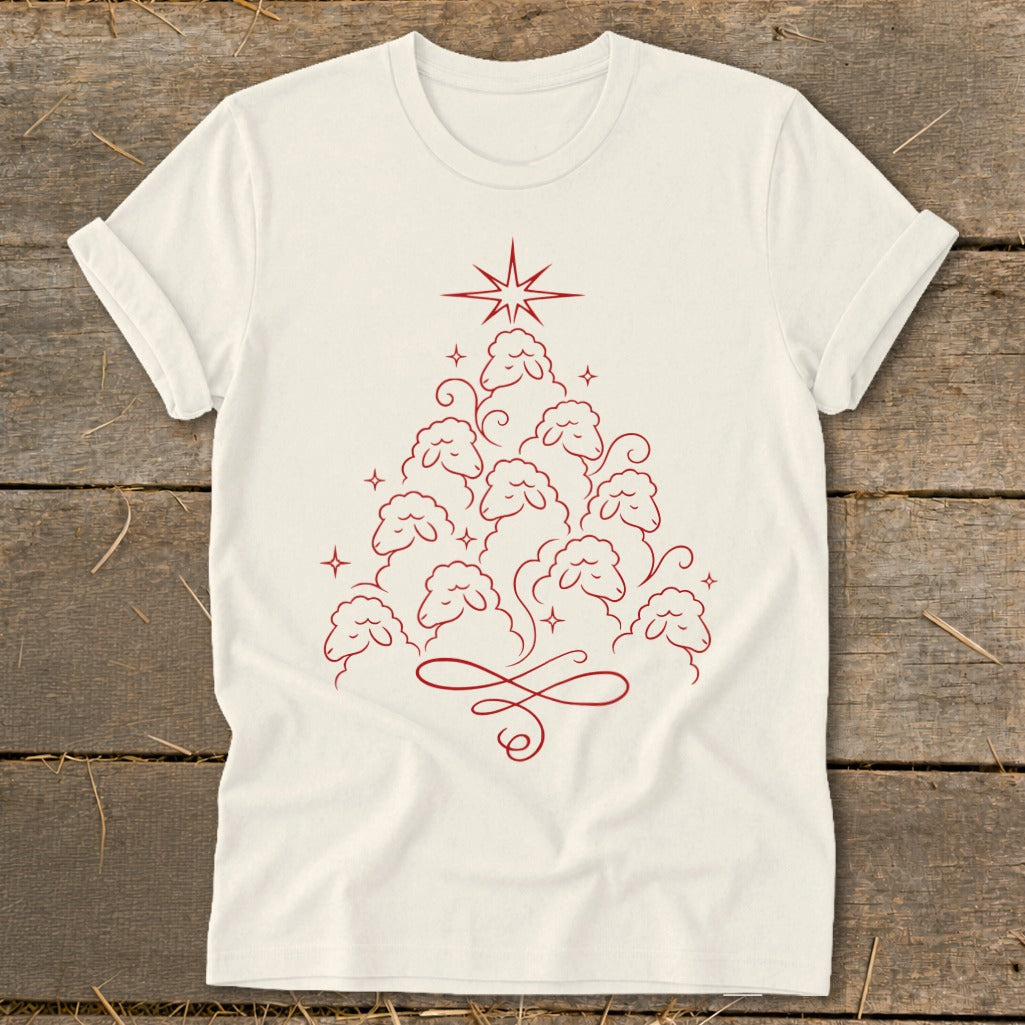 Cream t-shirt with red line art of sheep forming a Christmas tree with a star.