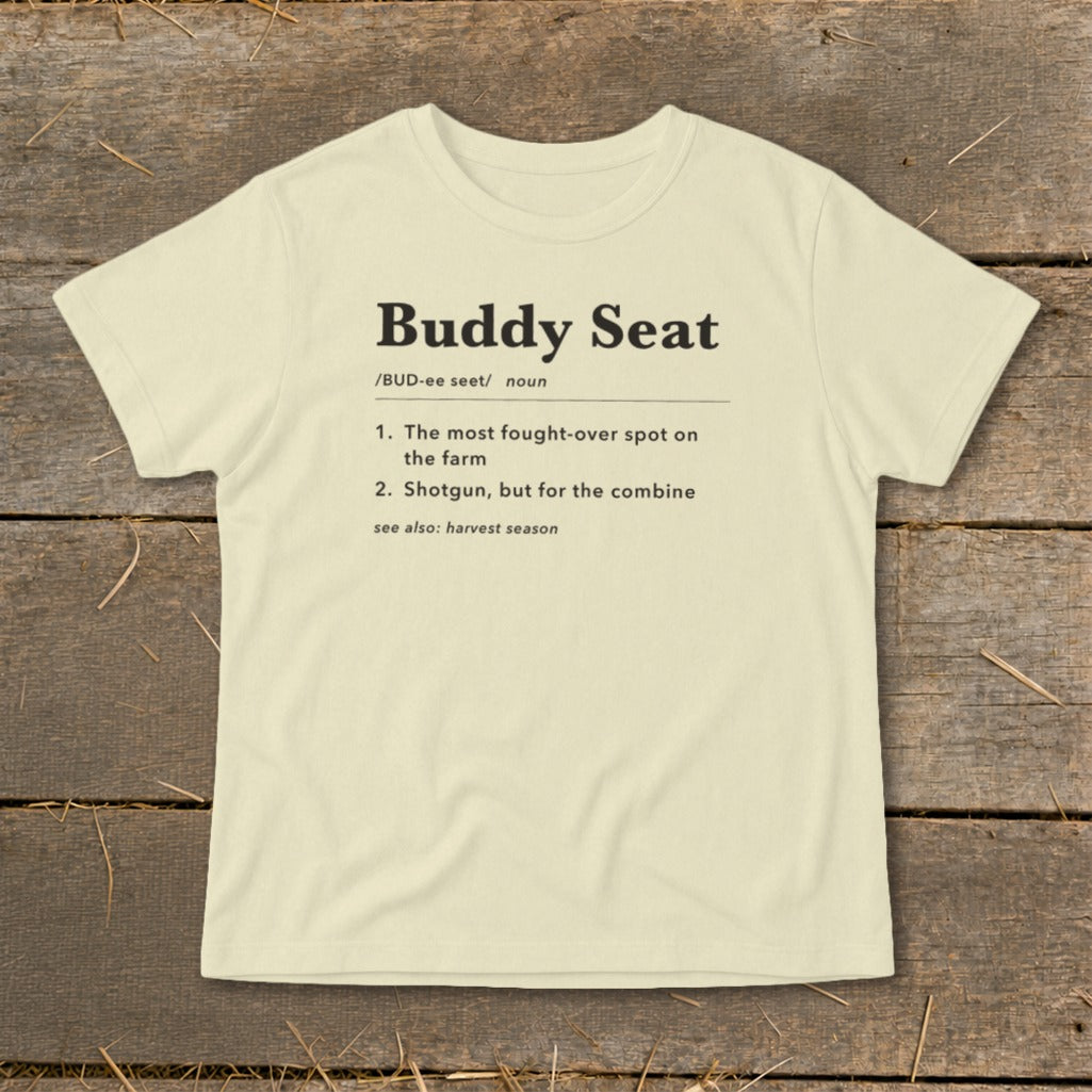 Cream t-shirt with "Buddy Seat" definition: fought-over spot or shotgun.