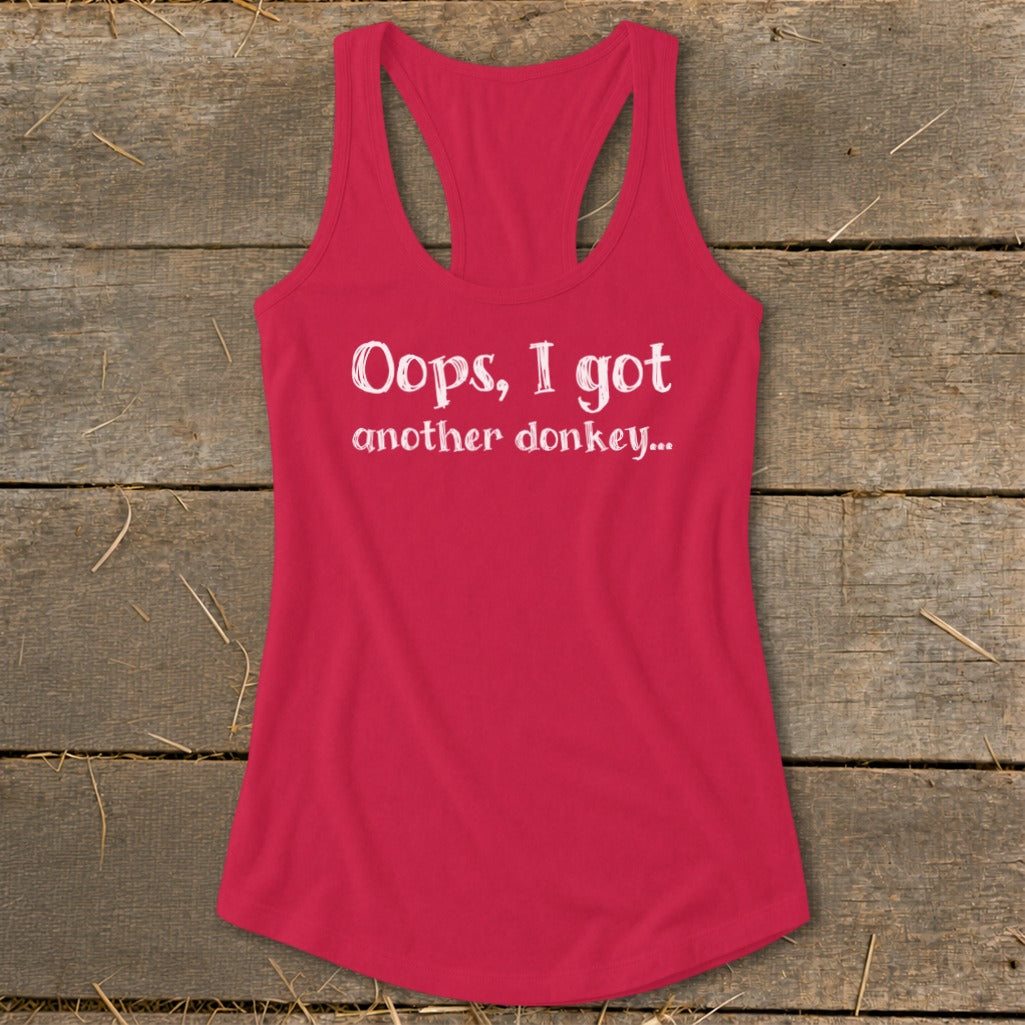Pink racerback tank top with white text "Oops, I got another donkey..."