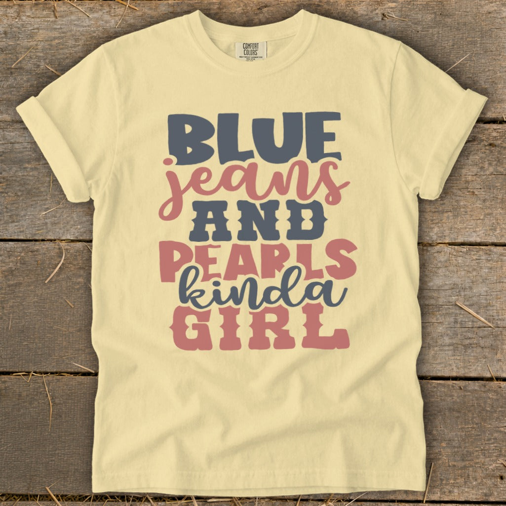 Yellow t-shirt with "BLUE jeans AND PEARLS kinda GIRL" text.