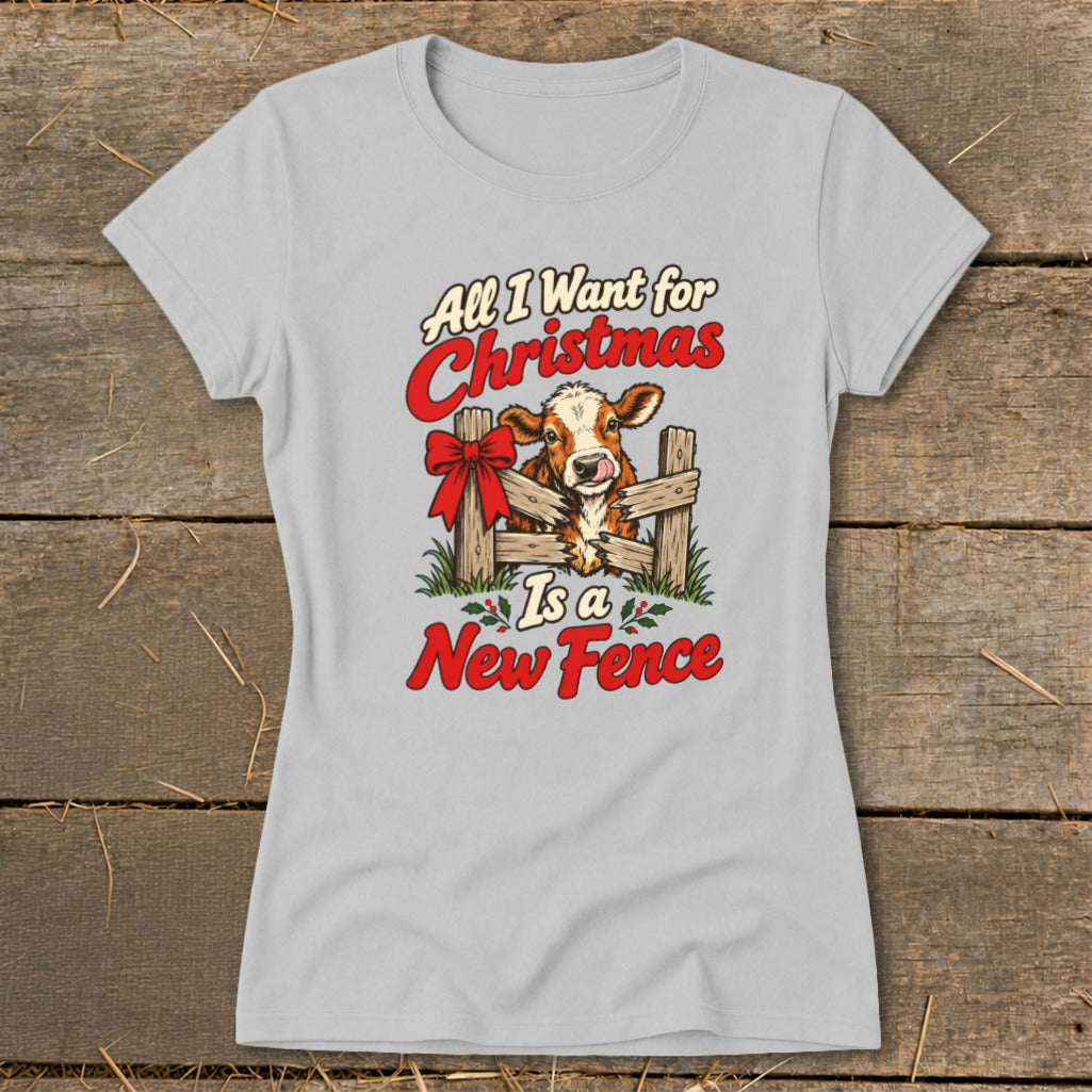 Cow behind fence with text "All I Want for Christmas Is a New Fence"