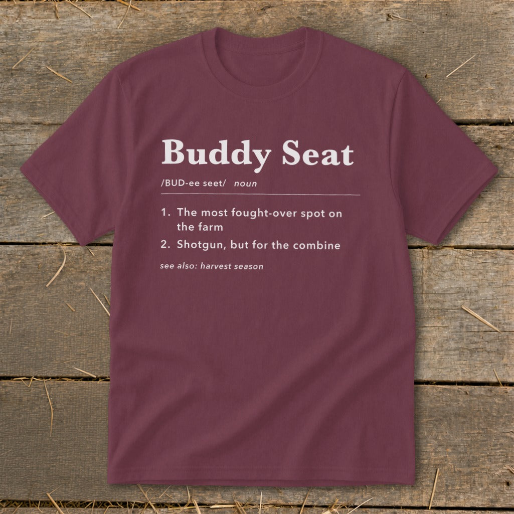 Maroon t-shirt with "Buddy Seat" definition and harvest season reference.