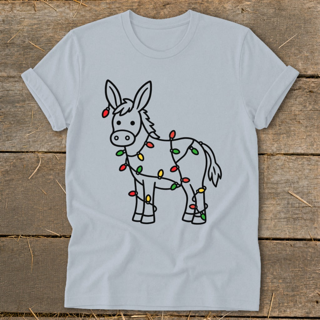 Light grey t-shirt with a cartoon donkey wrapped in colorful Christmas lights.