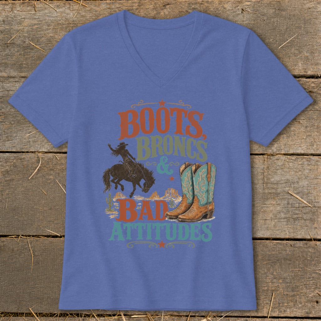 T-shirt with "Boots, Broncs & Bad Attitudes" text, cowboy, and boots graphic.