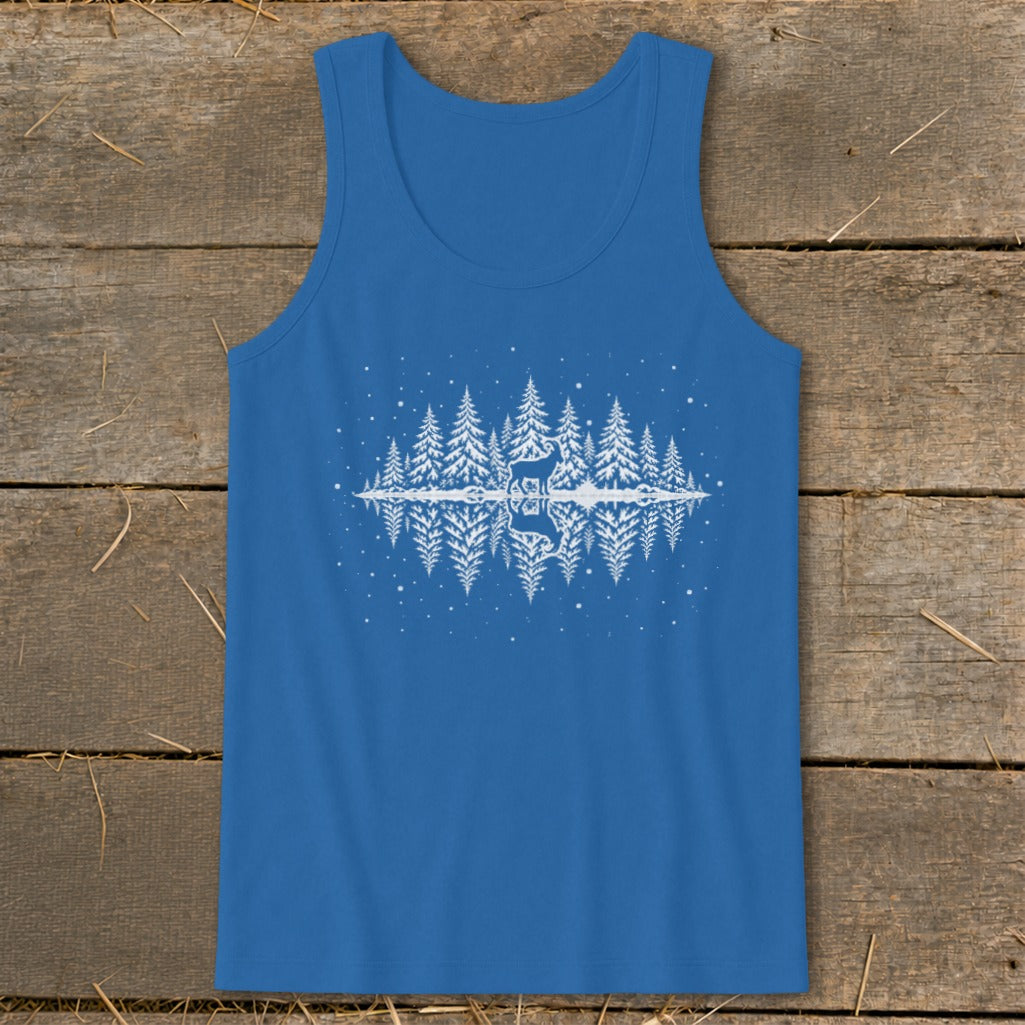 Blue tank top with a white graphic of a deer in a snowy forest reflected in water.