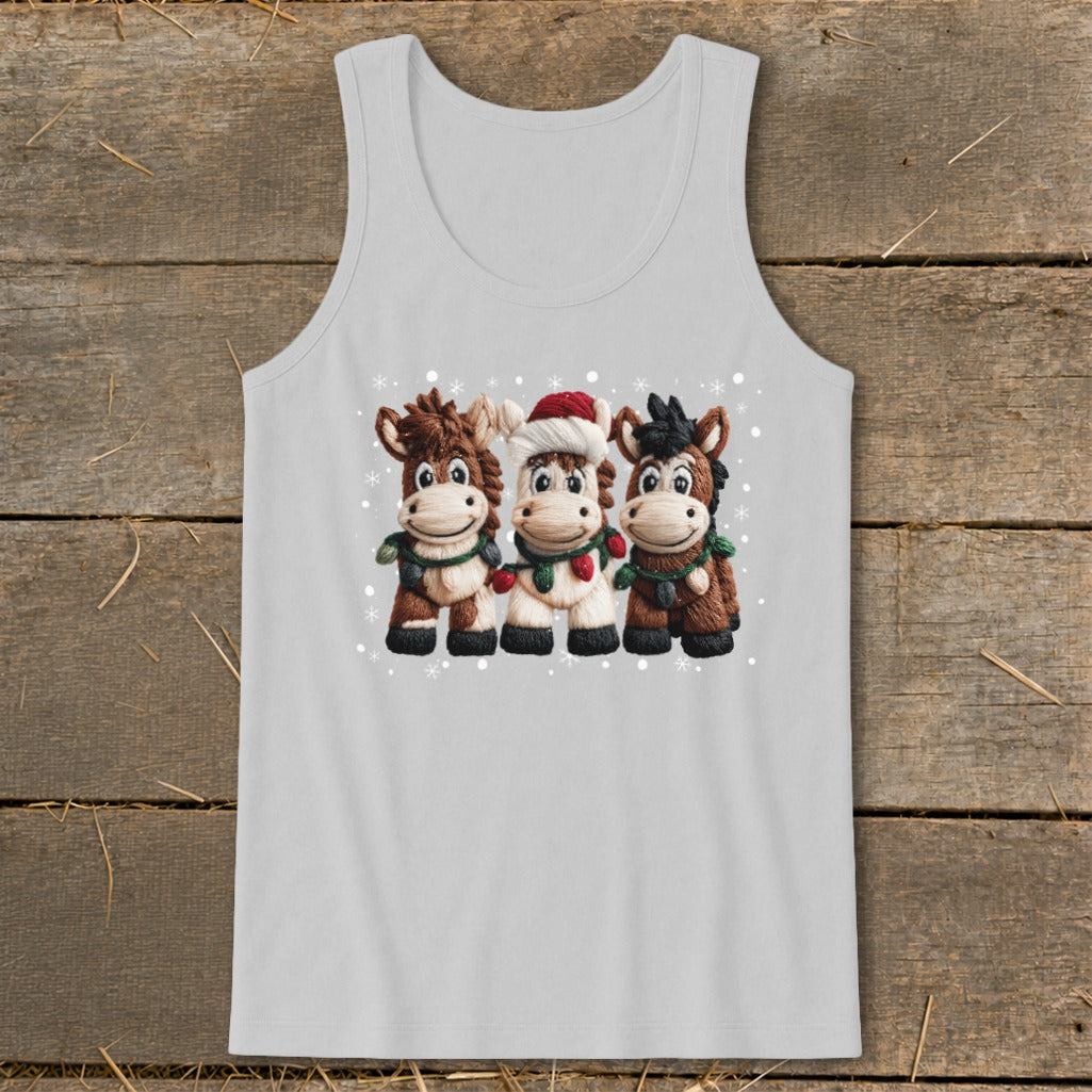 Three cartoon horses wearing scarves and Christmas lights, with one wearing a Santa hat.