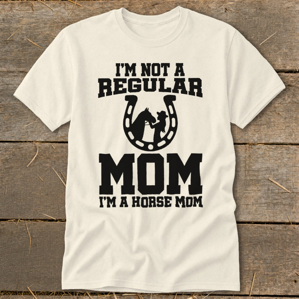 Cream t-shirt with "I'm Not A Regular Mom, I'm A Horse Mom" text and horseshoe graphic.