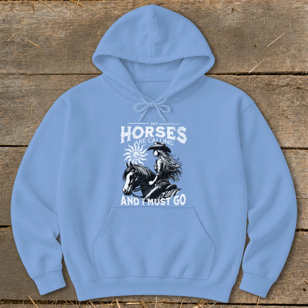 Light blue hoodie with "My Horses Are Calling And I Must Go" graphic.