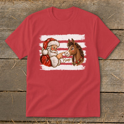 Santa's finger boops a horse's nose with the word "Boop" and bells.