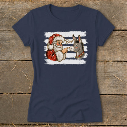 Santa touching a donkey's nose with the word "Boop" written on the shirt.