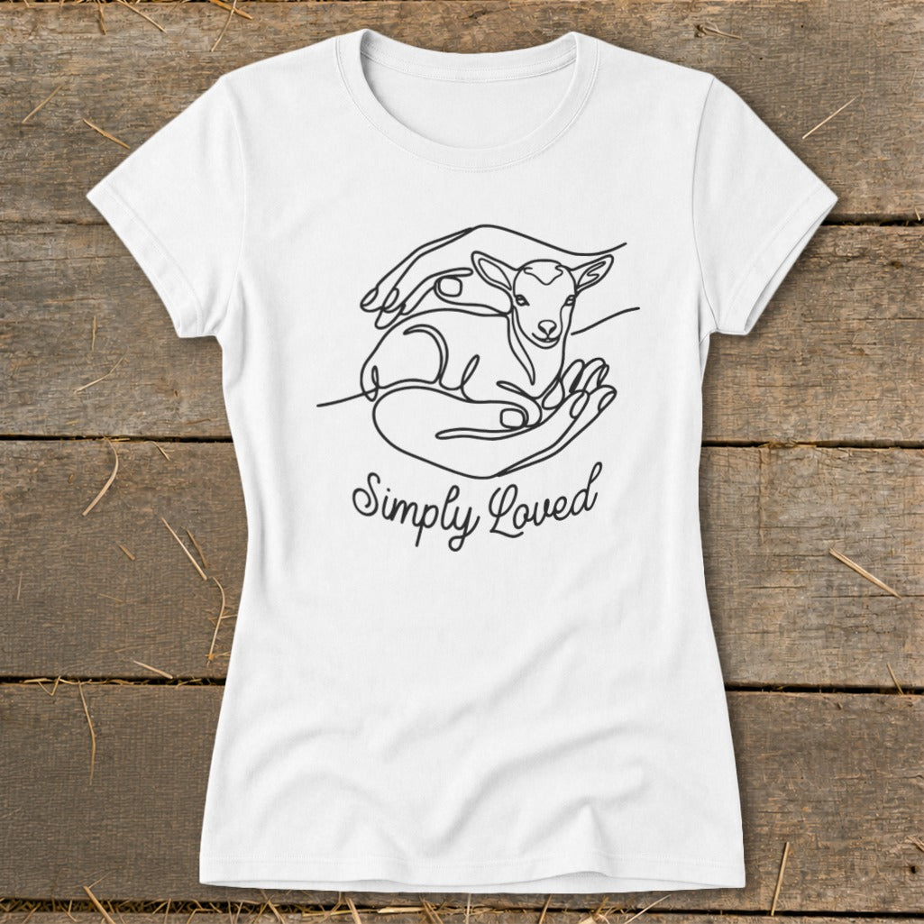 White t-shirt with a line drawing of hands cradling a lamb and text "Simply Loved".