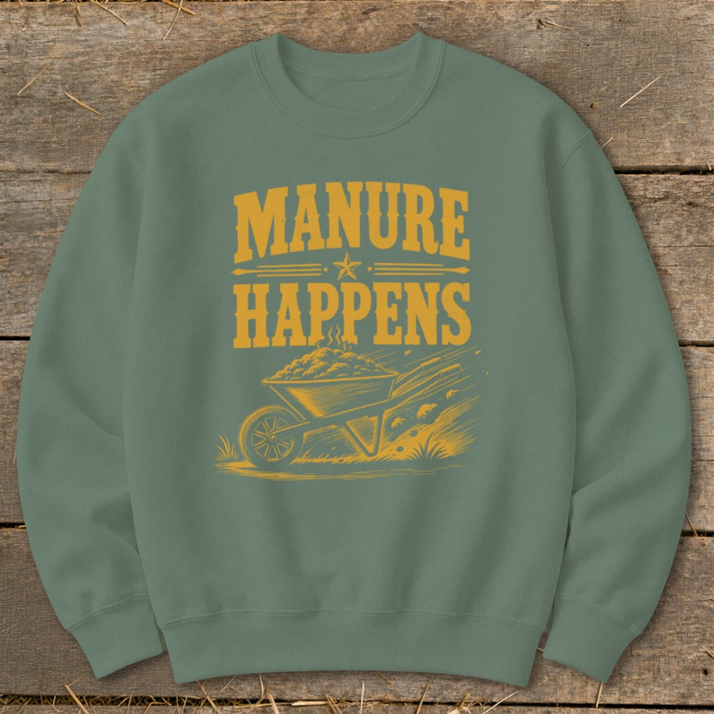 Green sweatshirt with yellow graphic of a wheelbarrow full of manure and text "MANURE HAPPENS".