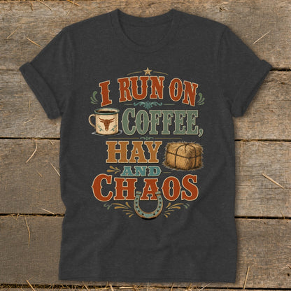 Dark t-shirt with text reading "I RUN ON COFFEE, HAY AND CHAOS" and graphics.