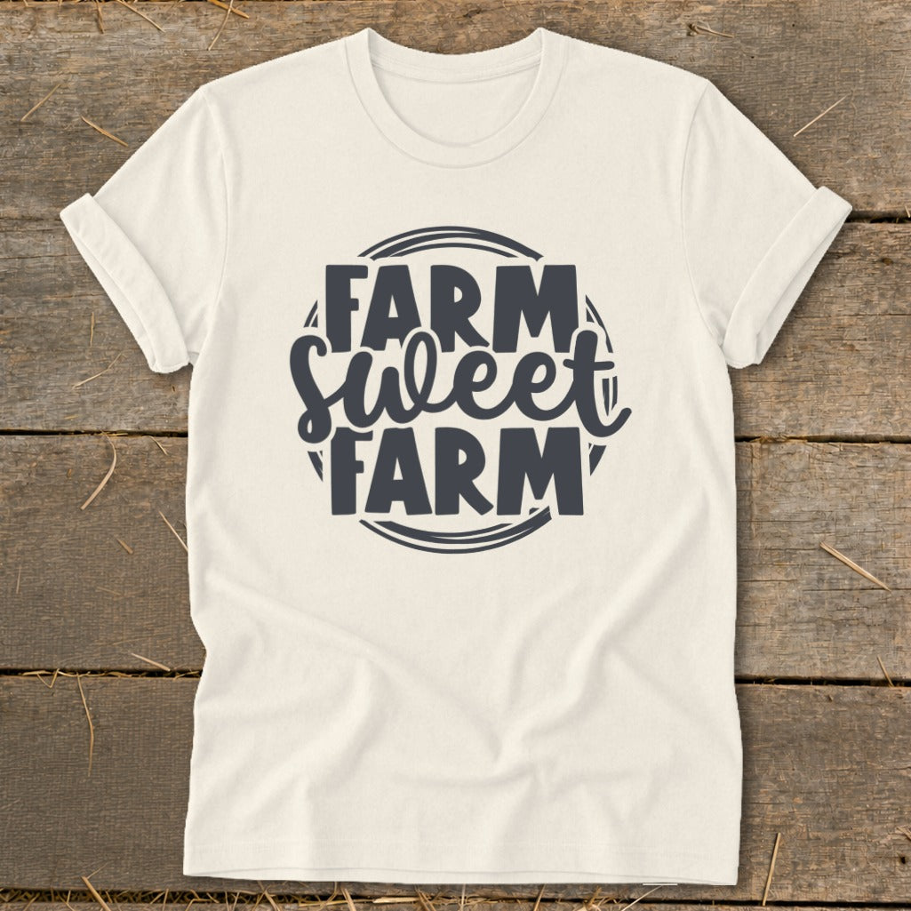 Cream t-shirt with "Farm Sweet Farm" text in dark blue graphic.