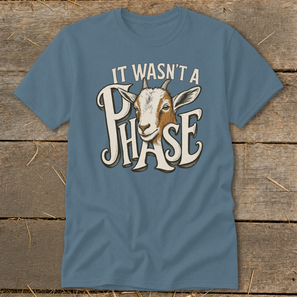 Blue t-shirt with a goat's head and text "IT WASN'T A PHASE".