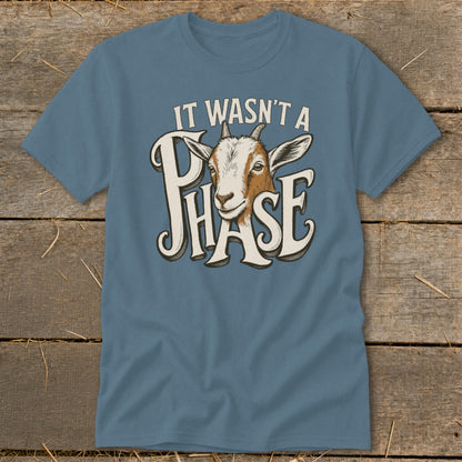 Blue t-shirt with a goat's head and text "IT WASN'T A PHASE".